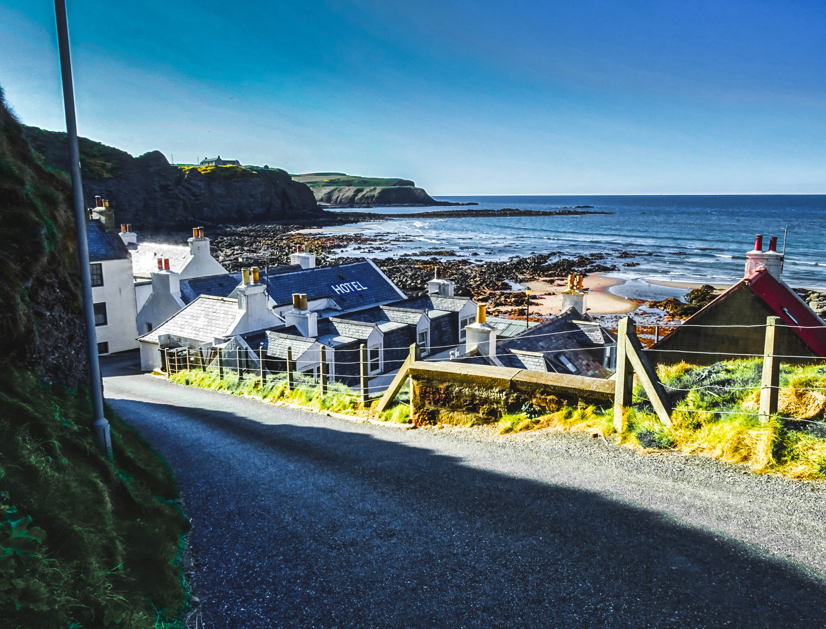 The road down to Pennan and The Pennan Inn
