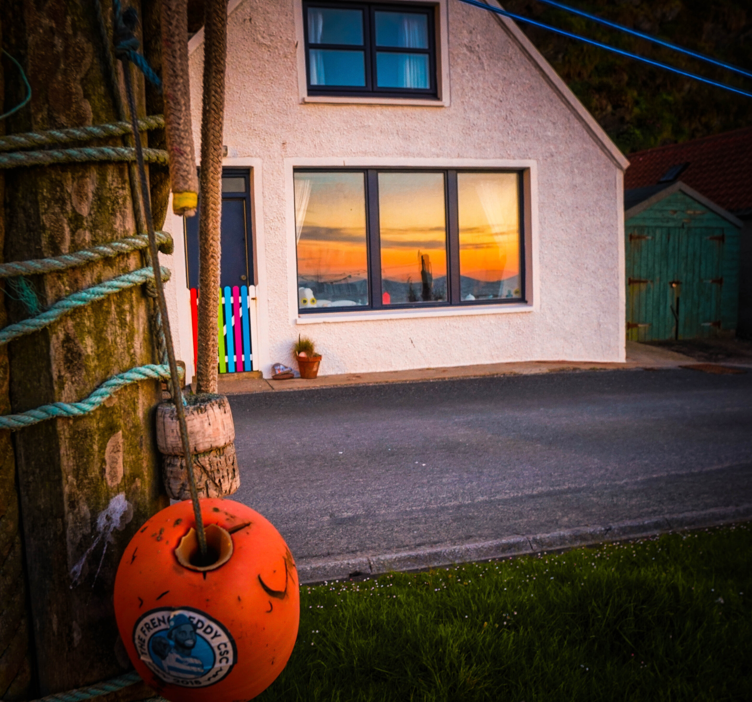 Cottage with sunset reflection